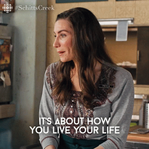 Woman Says It's About How You Live Your Life In Kitchen GIF
