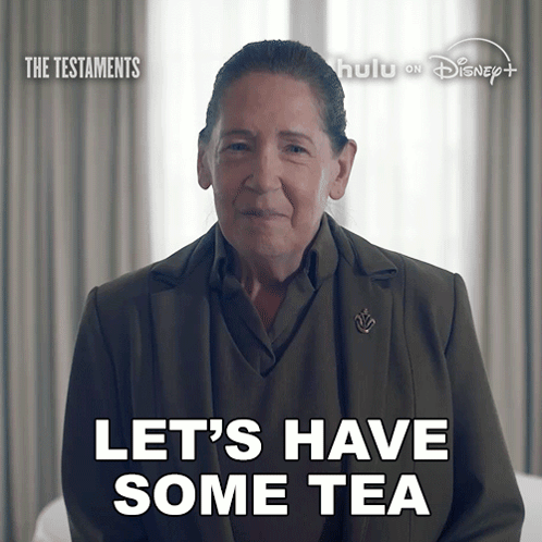 Woman Says Let's Have Some Tea In Front Of The Testaments Poster GIF