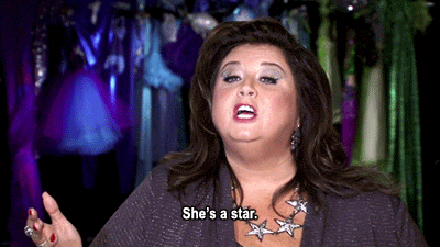 Woman Says She's a Star Wearing Necklace