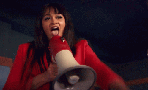 Woman Says Tes On A Megaphone GIF