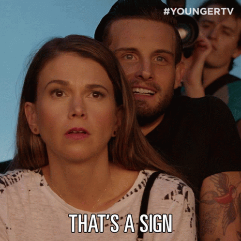 Woman Says That's A Sign Man Looks On GIF