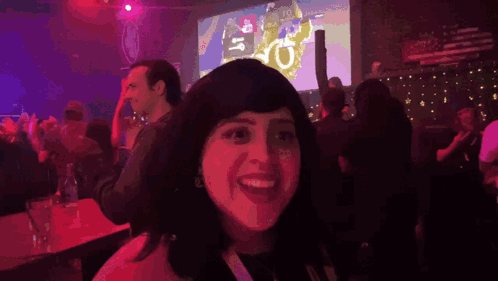 Woman Says We're in Front of Large Screen