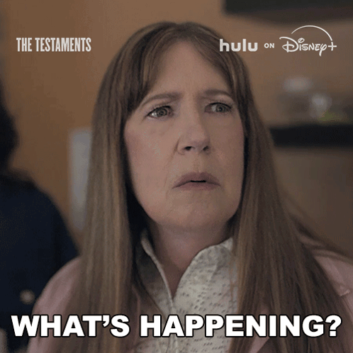 Woman Says What's Happening In Front Of Hulu On Disney Sign GIF