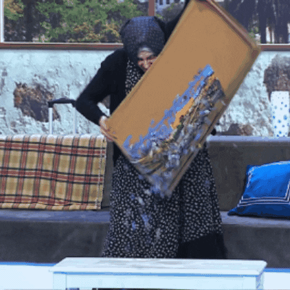 Woman Scattering Jigsaw Puzzle Pieces On The Floor GIF