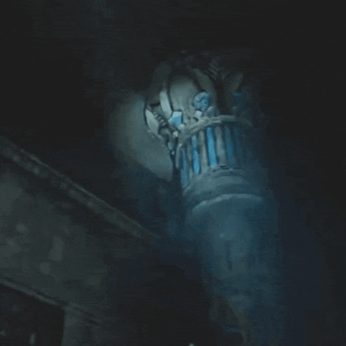 Woman Screaming In Dark Room With Pillar GIF