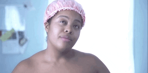 Woman Shakes Head Hmmmm GIF