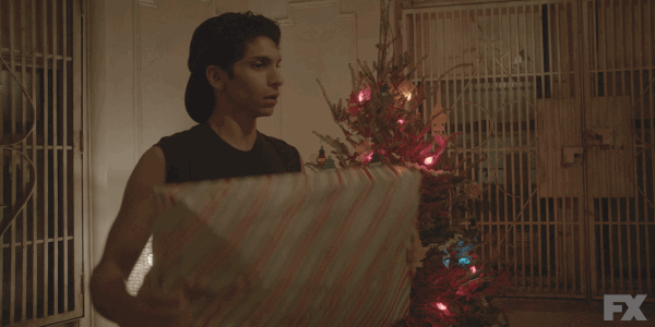 Woman Shaking Gift GIF