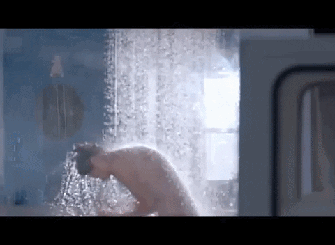 Woman Showering Merrily GIF
