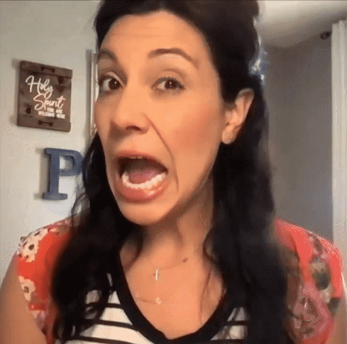 Woman Shows How To Wink Wink GIF