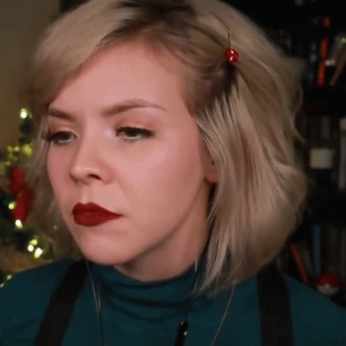 Woman Shows Unamused Face GIF