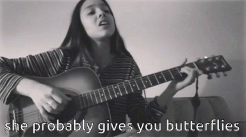Woman Singing And Playing Guitar GIF