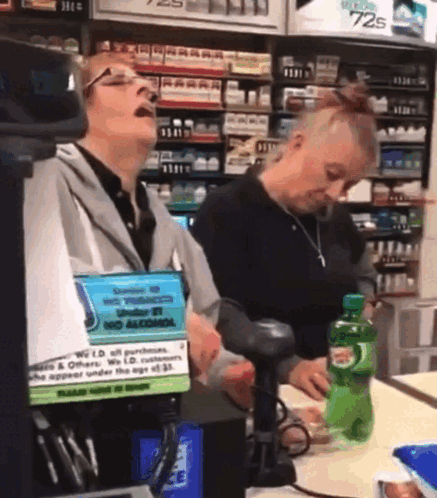 Woman Singing in Front of No Alcohol Sign