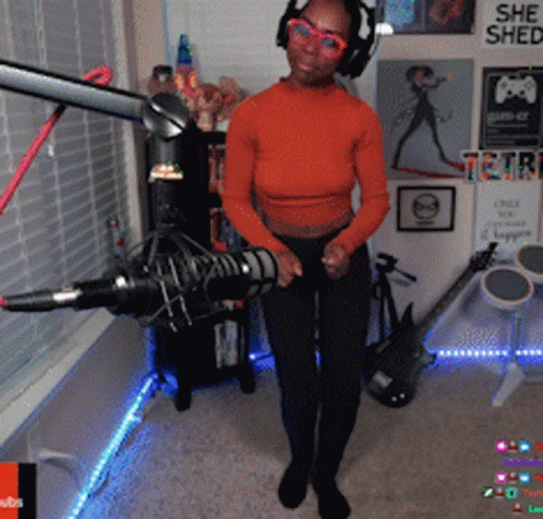 Woman Singing In Front Of She Shed Sign GIF