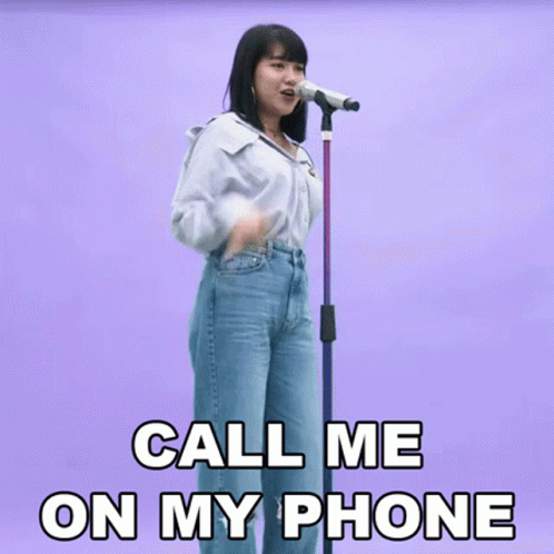 Woman Singing Into Mic Call Me On My Phone