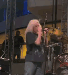 Woman Singing Into Microphone GIF