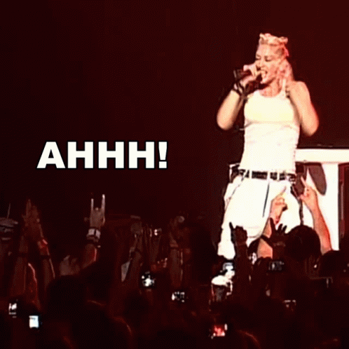 Woman Singing Into Microphone Ahhh