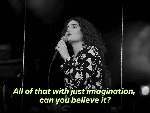 Woman Singing Into Microphone All of That With Just Imagination Can You Believe It