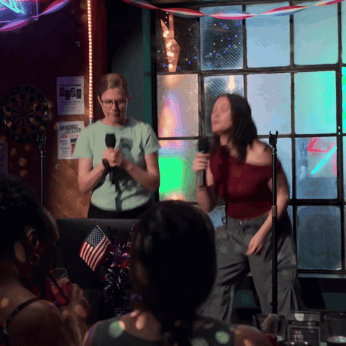 Woman Singing Into Microphone at Imperial Hotel