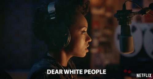 Woman Singing Into Microphone Dear White People