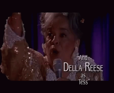 Woman Singing Into Microphone Della Reese
