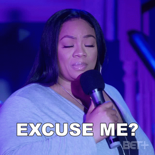 Woman Singing Into Microphone Excuse Me