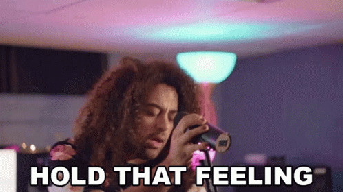 Woman Singing Into Microphone Hold That Feeling