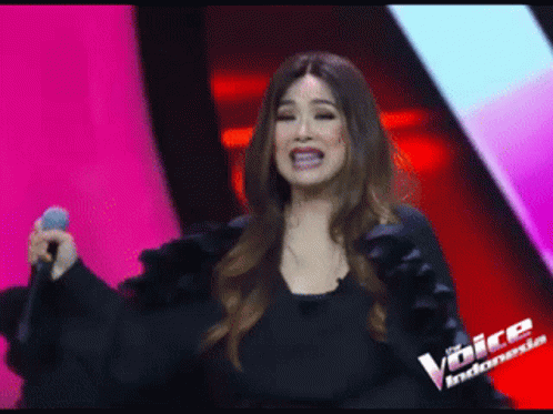 Woman Singing Into Microphone Indonesia