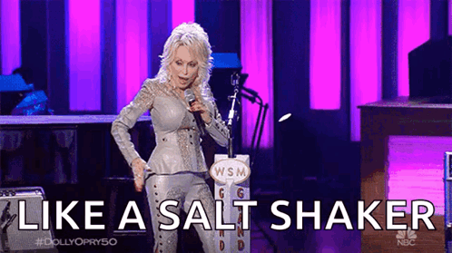 Woman Singing Into Microphone Like a Salt Shaker