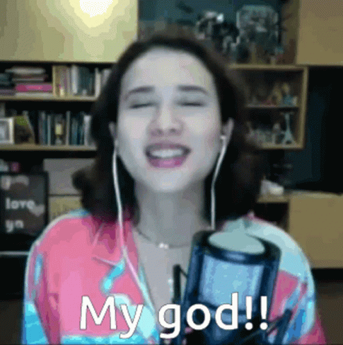 Woman Singing Into Microphone My God