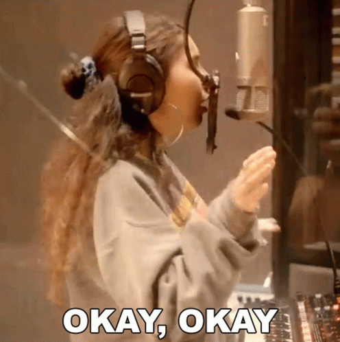 Woman Singing Into Microphone Okay Okay