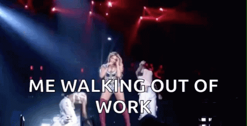 Woman Singing Into Microphone On Stage Beside Man GIF