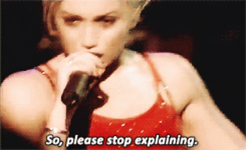Woman Singing Into Microphone