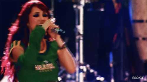 Woman Singing Into Microphone Saying Brasil GIF