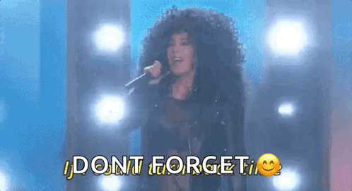 Woman Singing Into Microphone Saying Dont Forget