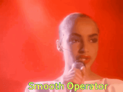 Woman Singing Into Microphone Smooth Operator