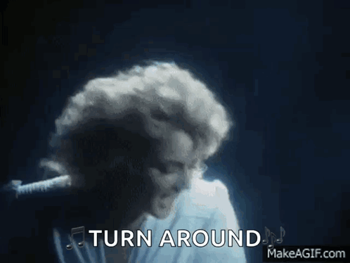 Woman Singing Into Microphone Turn Around