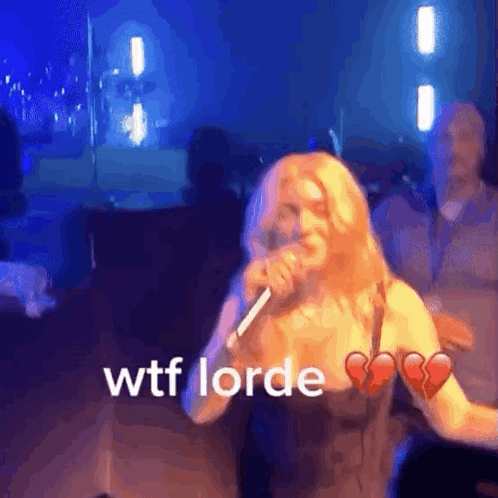 Woman Singing Into Microphone WTF Lorde GIF