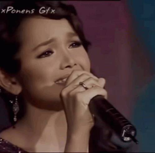 Woman Singing Into Microphone xponens gfx