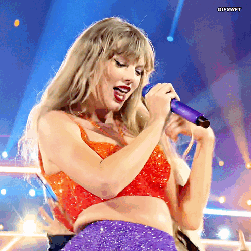 Woman Singing into Purple Microphone