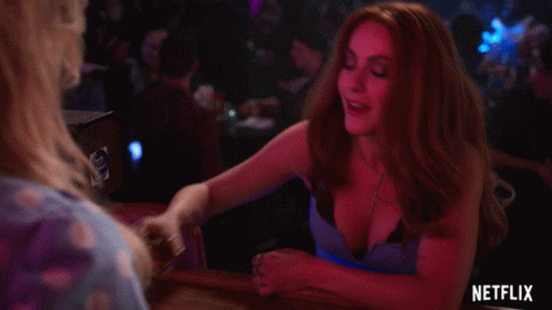 Woman Sitting at Bar With Netflix
