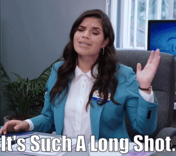 Woman Sitting at Desk Saying It's Such a Long Shot