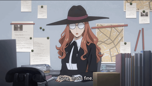 Woman Sitting at Desk Saying Sure
