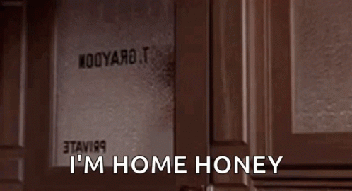 Woman Sitting at Door Saying I'm Home Honey