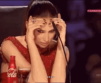 Woman Sitting At Microphone With Coca Cola GIF