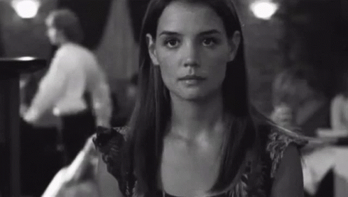 Woman Sitting At Restaurant Table GIF