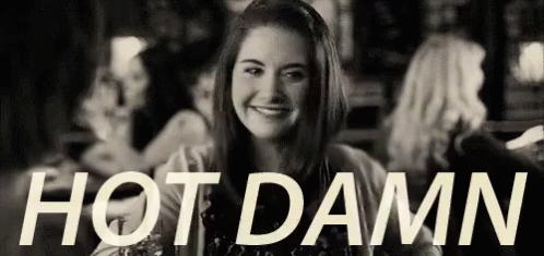 Woman Sitting At Table Hot Damn GIF