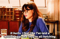 Woman Sitting at Table Saying It Hurts
