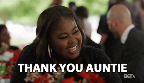 Woman Sitting At Table Saying Thank You Auntie GIF