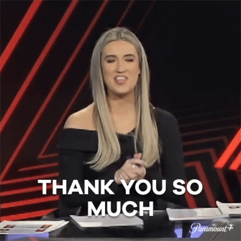 Woman Sitting at Table Saying Thank You