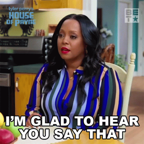 Woman Sitting at Table Says I'm Glad to Hear You Say That